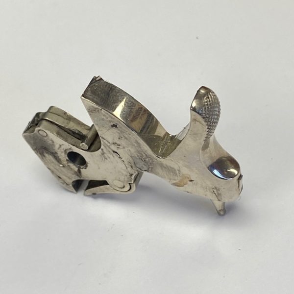 Colt E hammer assembly, nickel, checkered, has been re-nickeled and nickel is peeling #443-50447N-C