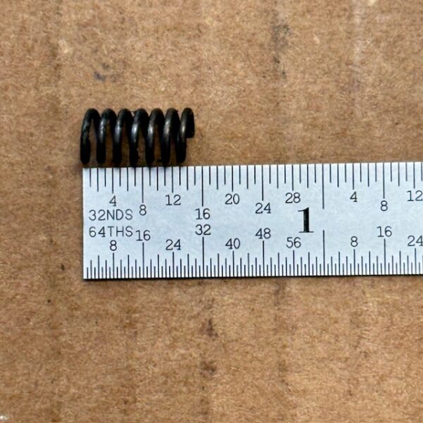 Armalite AR180 magazine latch spring