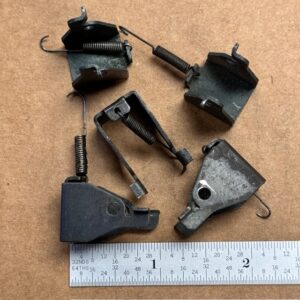 Remington Nylon disconnector pivot with spring - 1 hole on each side, #652-16565-1A