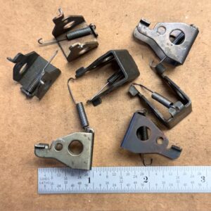 Remington Nylon disconnector pivot with spring - 2 holes on each side, #652-16565-A