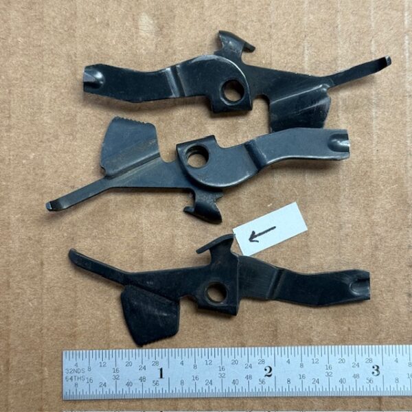 Remington 870 action bar lock with v-notch at spring hook area (see picture), #1066-18849U-1