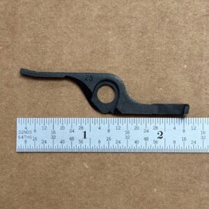 Remington 1100 interceptor latch marked "28", #1068-26636-1